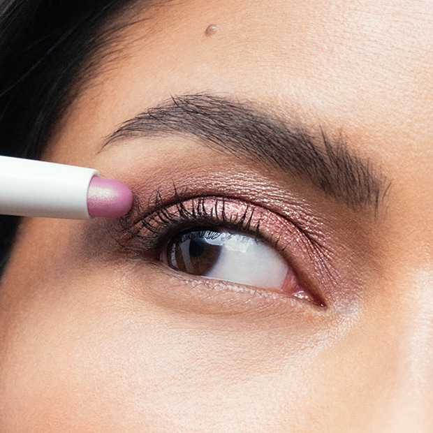 Model removing makeup with our gentle yet powerful Soothing Cleansing Oil